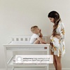 image:imageDelta Children Flat Top Changing Table with Wheels and Changing Pad  Greenguard Gold Certified Bianca WhiteBianca White