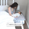 image:imageDelta Children Simmons Kids Dream Bedside Bassinet with ZipDown Side Wall  Convenient Baby Sleeper with Breathable Mesh and Adjustable Heights  Lightweight Portable Crib Grey