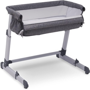 image:imageDelta Children Simmons Kids Dream Bedside Bassinet with ZipDown Side Wall  Convenient Baby Sleeper with Breathable Mesh and Adjustable Heights  Lightweight Portable Crib Grey
