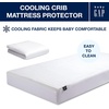 image:imageDelta Children  babyGap Crib Mattress Protector for Infants and Toddlers  Waterproof Cooling Soft Quilted Elastic and Washable Baby Mattress Protector in White Quiet Comfort
