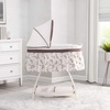 image:imageDelta Children Deluxe Sweet Beginnings Bedside Bassinet  Portable Crib with Lights and Sounds Falling LeavesFalling Leaves