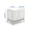 image:imageDelta Children Emery Mini Convertible Baby Crib with 275inch Mattress Bianca White