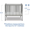 image:imageDelta Children Folding Portable Mini Baby Crib with 15inch Mattress  Greenguard Gold Certified WhiteGrey