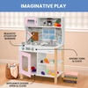 image:imageDelta Children Gourmet AllinOne Corner Play Kitchen  Toy Kitchen Playset with Safe amp Heatless Stove with Lights Oven Sink FridgeFreezer with Ice Maker and 20 Accessories NaturalWhitePink