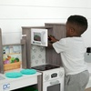 image:imageDelta Children Gourmet AllinOne Corner Play Kitchen  Toy Kitchen Playset with Safe amp Heatless Stove with Lights Oven Sink FridgeFreezer with Ice Maker and 20 Accessories NaturalWhiteNaturalWhite
