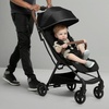 image:imageJeep Altitude Compact Travel Stroller by Delta Children Greenguard Gold Easy One Hand Fold Lightweight Extendable Canopy with PeekaBoo Window Reclining Seat 4 Wheel Suspension TanBlack