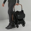 image:imageJeep Altitude Compact Travel Stroller by Delta Children Greenguard Gold Easy One Hand Fold Lightweight Extendable Canopy with PeekaBoo Window Reclining Seat 4 Wheel Suspension TanBlack