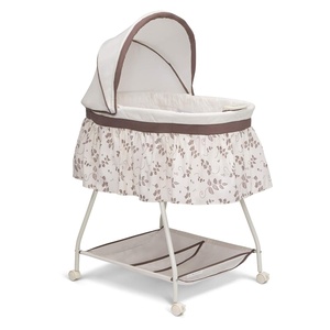 image:imageDelta Children Deluxe Sweet Beginnings Bedside Bassinet  Portable Crib with Lights and Sounds Falling LeavesFalling Leaves
