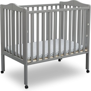 image:imageDelta Children Folding Portable Mini Baby Crib with 15inch Mattress  Greenguard Gold Certified WhiteGrey