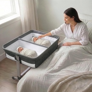 image:imageSimmons Kids By The Bed City Sleeper Bassinet for Twins  Adjustable Height Portable Crib with Wheels amp Airflow Mesh Grey Tweed